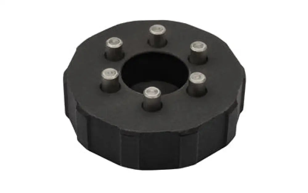 Black hexagonal AAC TI-RANT front cap replacement tool with silver studs